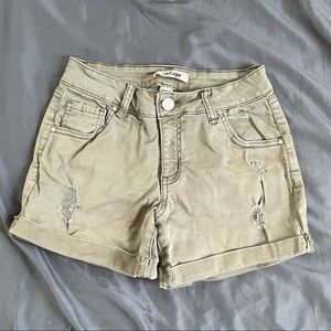 camo green shorts with rolled hem